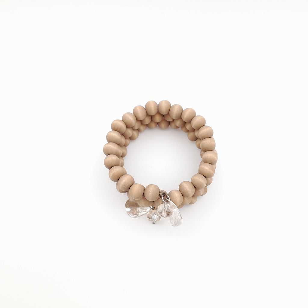 Stone-coloured beaded bracelet in beige and cream tones by Marzipan